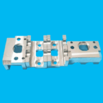 Precision CNC machined metal manifold plate with complex hole patterns