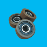 Polyurethane coated roller bearings for conveyor tracking and guiding