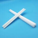 White plastic clip-on C-shape guide track wear strip