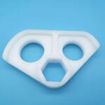 CNC machined custom UHMWPE mounting bracket with hex hole