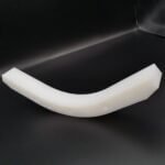 Custom CNC machined UHMWPE curved chain guide wear block