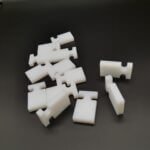 Interlocking modular UHMWPE chain guide wear inserts