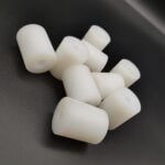 Machined UHMWPE conveyor guide rollers and cylindrical spacers