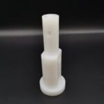 Custom machined plastic stepped positioning shaft pin