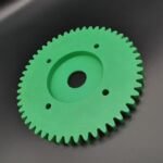 Custom machined green UHMWPE drive gear