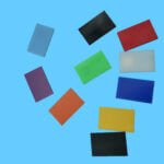 Various colors of engineering plastic sheets including POM, Nylon, and PP sample blocks